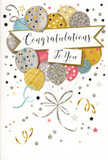 The photograph displays a refined congratulations card that feels like a quiet yet sparkling celebration, ideal for slipping alongside a bouquet delivered around Old Oak Common. At its centre, a bouquet of illustrated balloons fills the space, their rounded forms overlapping and drifting upward in an easy, buoyant cluster. The balloons are tinted in an elegant mix of metallic-inspired hues: warm gold, brushed silver, champagne, powder blue, soft rose pink, and misty grey. Each one is individually decorated with fine stripes, delicate star patterns, or tiny shimmering dots, creating the impression of subtle glitter and foil reflecting soft indoor light. These details give the balloons a sense of dimension and gentle movement, as though they are slowly swaying. From the base of the bunch trail slender ribbons in glistening gold and silvertones, curling and looping in smooth arcs before gathering into a neat flourish, reminiscent of the precise final twist of ribbon on a hand-tied floral arrangement. Around the balloons, scattered stars, little confetti specks, and swirling flourishes float against a pale, neutral background, conjuring the feeling of confetti in the air after a heartfelt round of applause. Across the centre, a softly curving banner unfurls, bearing the words Congratulations To You in graceful cursive script that radiates warmth and sincerity. You can almost imagine the light texture of the card between your fingers and the subtle glint of the metallic details. The overall feeling is one of understated joy and meaningful recognition-perfect for celebrating achievements big or small in the Old Oak Common community, whether it's a promotion, exam success, a new role, or any proud moment where you want your congratulations to feel special and thoughtfully expressed.